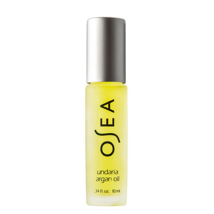 Tall skinny bottle of OSEA vegan face oil