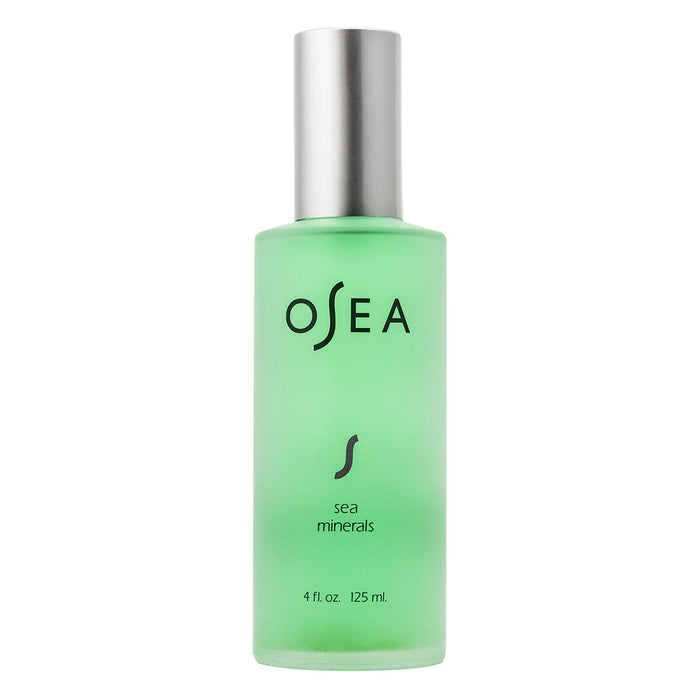 Green clear bottle with OSEA natural plant based mineral mist in it